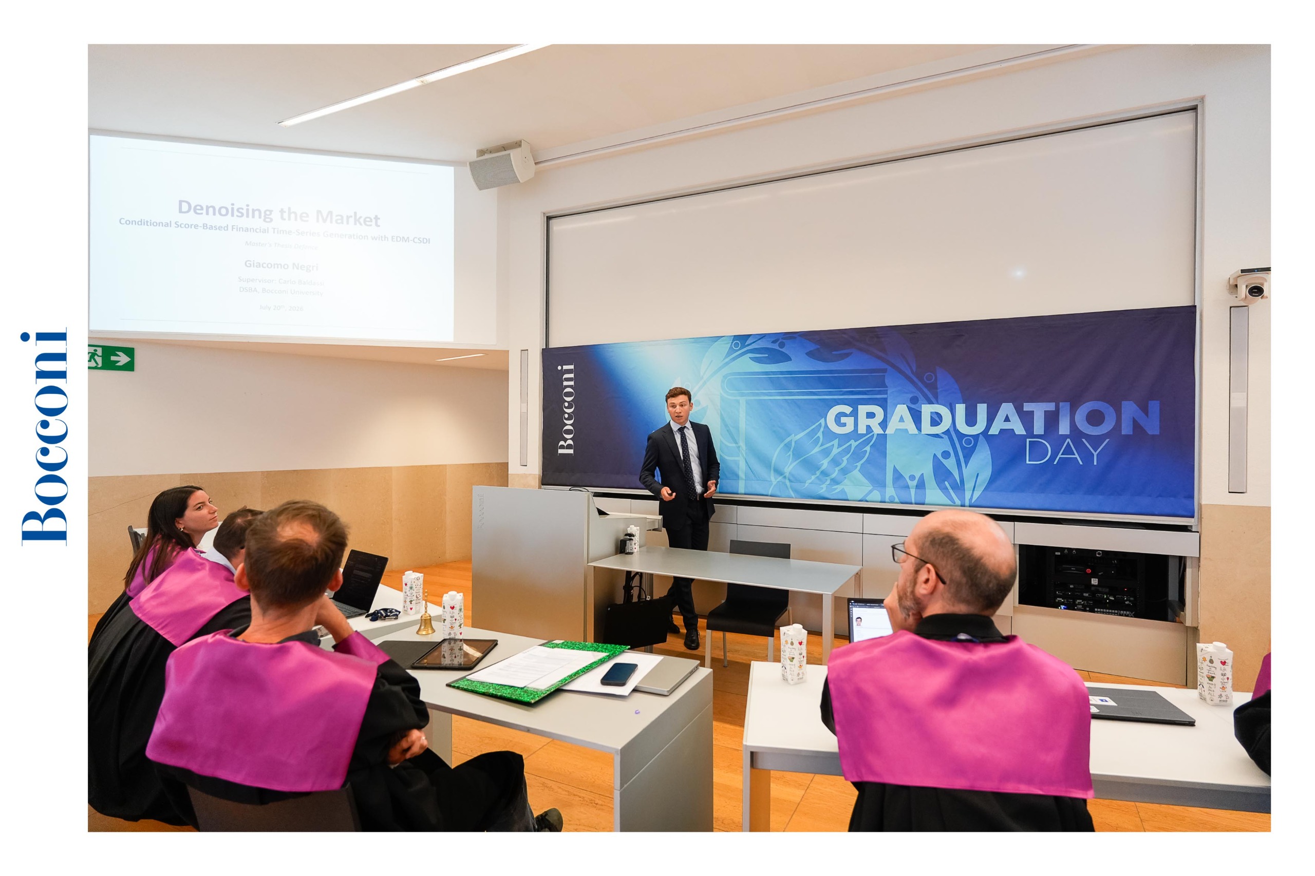 Graduation picture while discussing the thesis